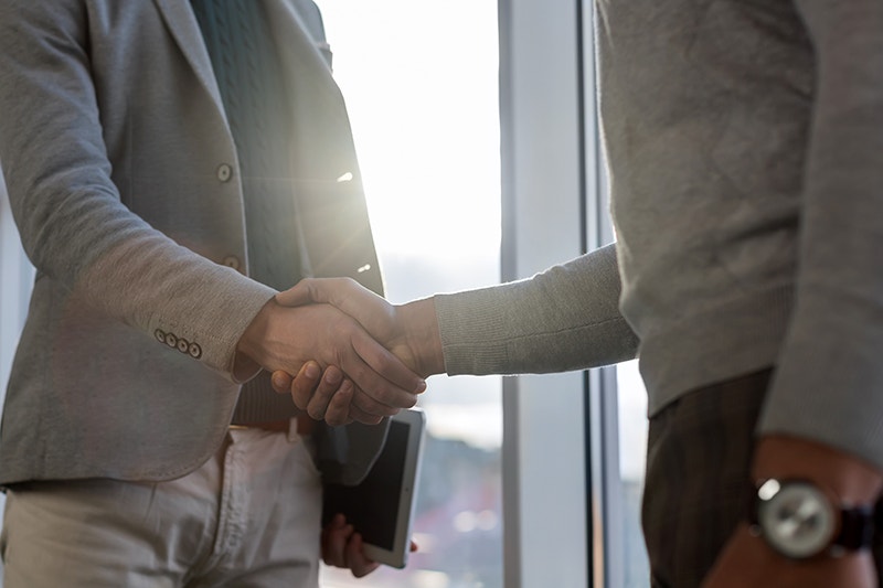 business men shake hands