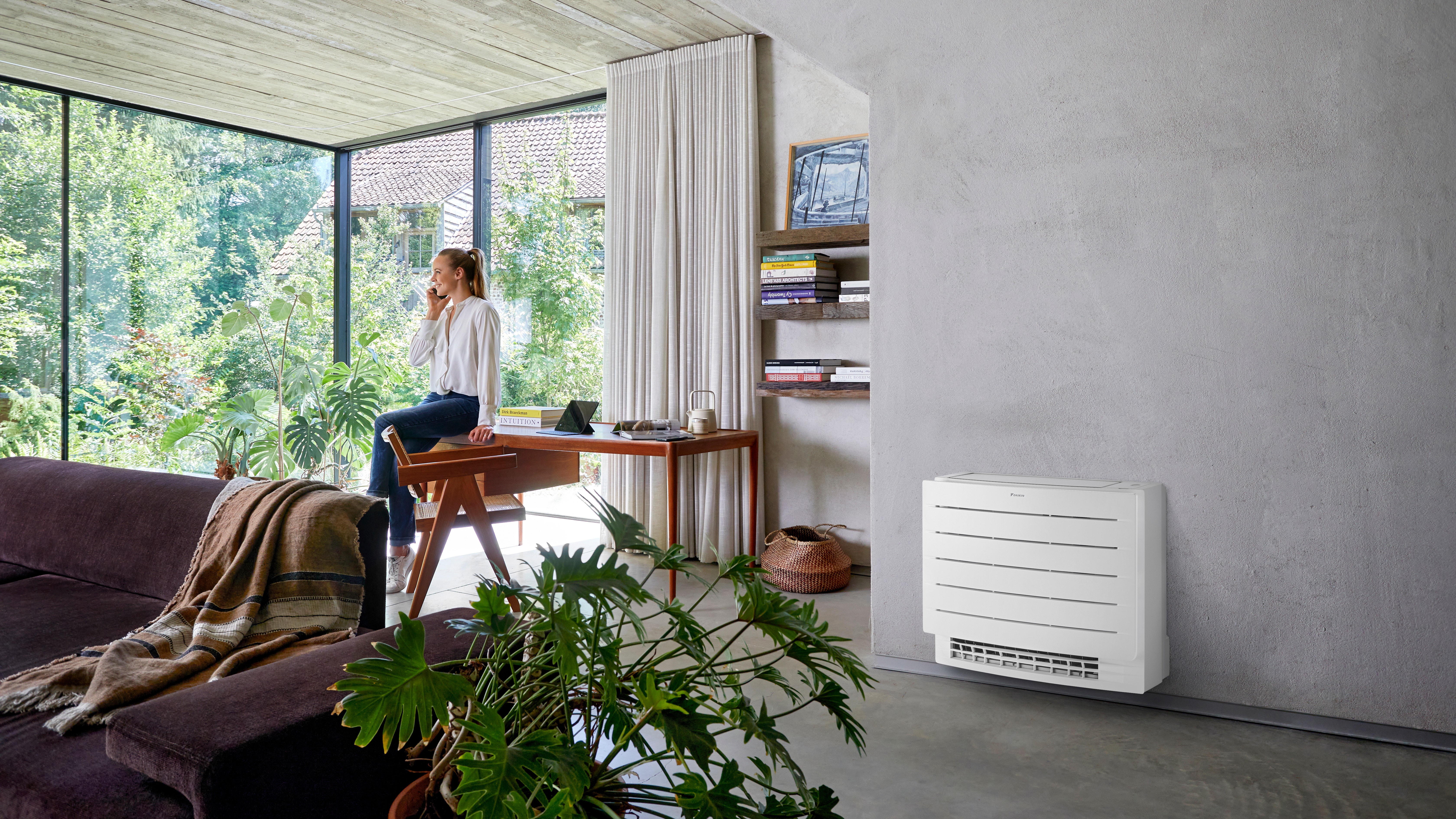 A woman calling in her living room