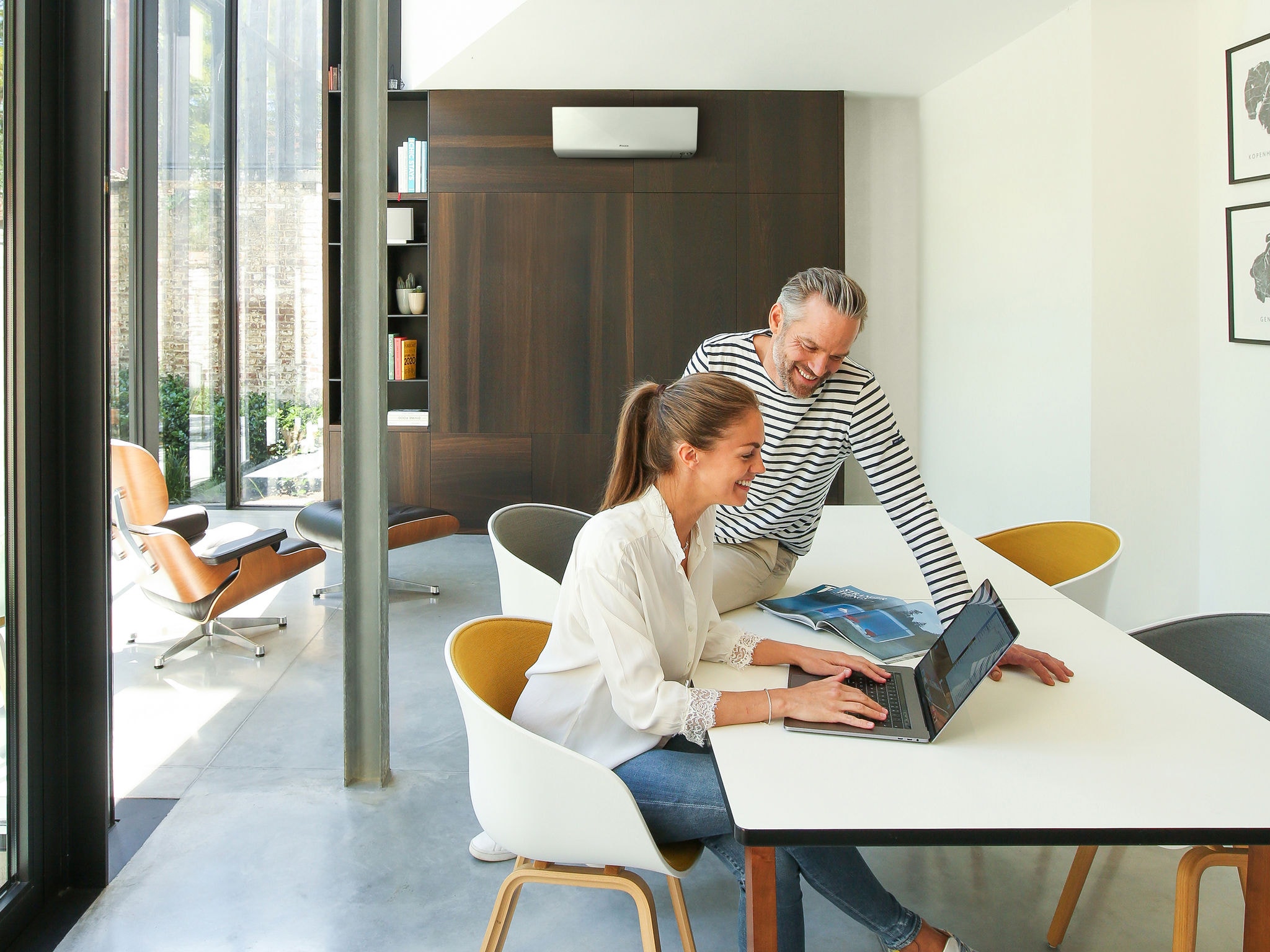 a couple working together in their home office